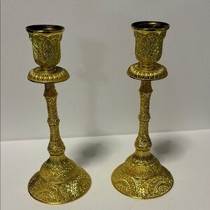 Ornate Gold Candlesticks with Intricate Patterns